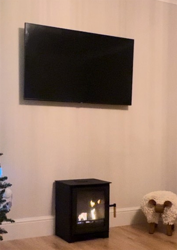 Can I hang a TV directly over the fire? Customer image from Mark - Bioethanol stoves FAQ